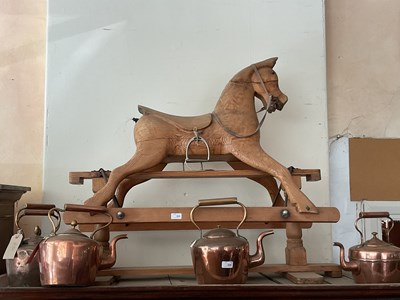 Lot 335 - A vintage pine rocking horse, length 115cm.