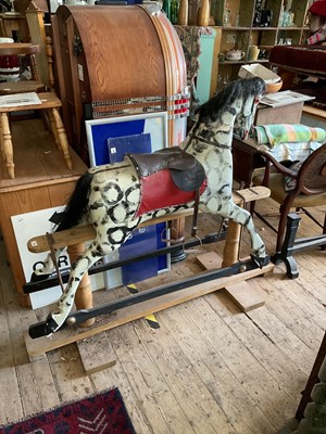 Lot 349 - A vintage painted rocking horse on pine base,...