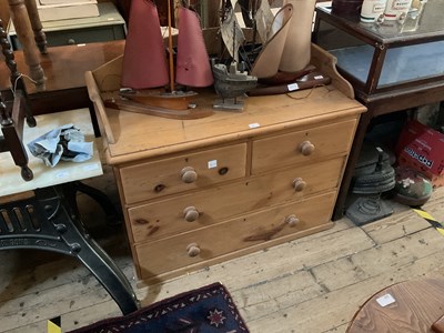 Lot 371 - An old pine wash stand with raised back above...