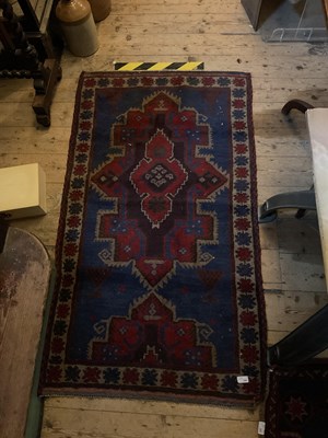 Lot 396 - A decorative Eastern rug with stylised...