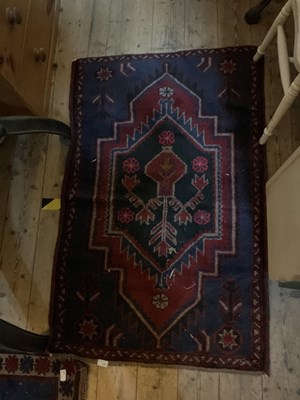 Lot 397 - A decorative Eastern rug with floral...