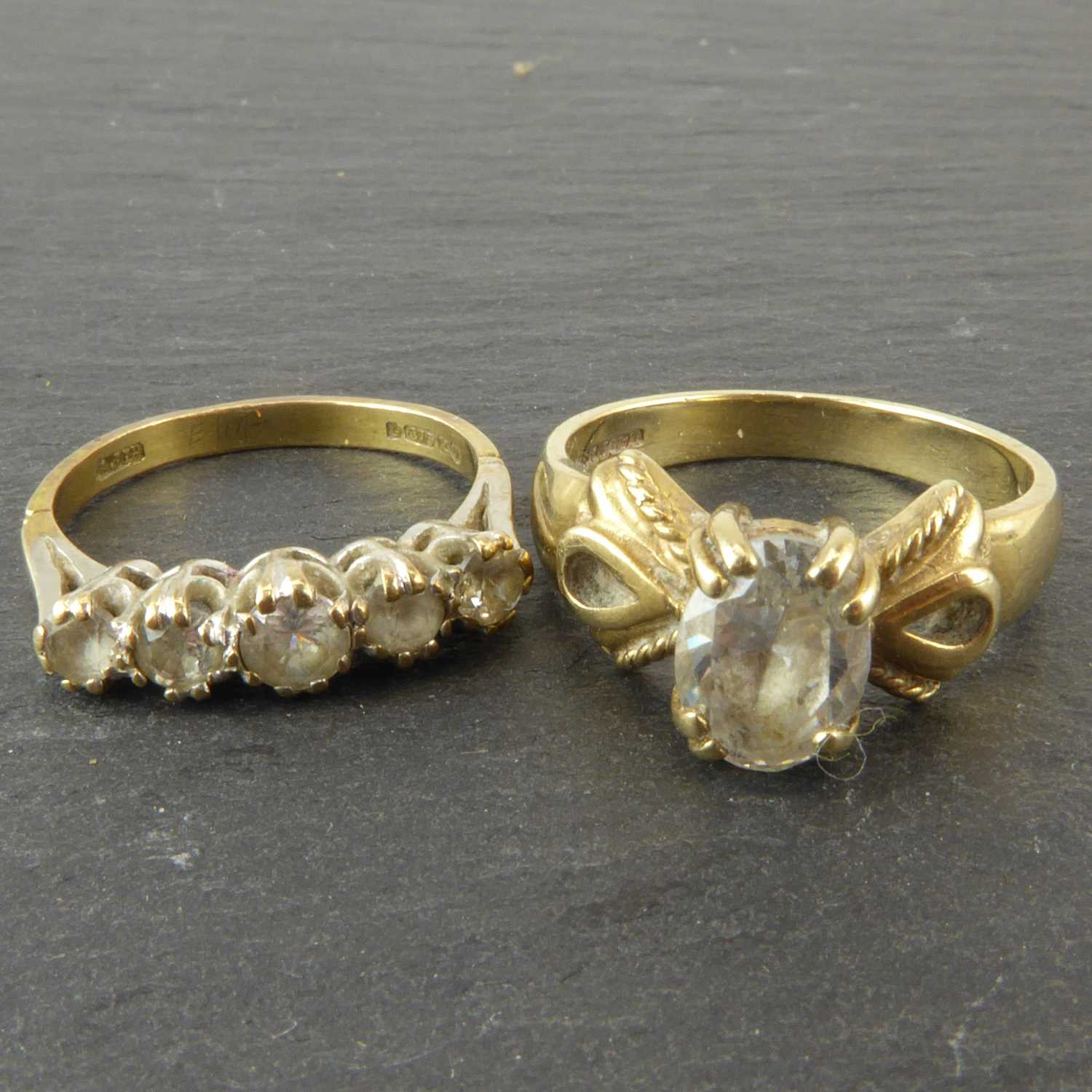 Lot 1066 - Two 9ct gold dress rings, one with five claw...