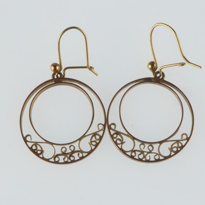 Lot 1275 - A pair of circular rose gold earrings with...