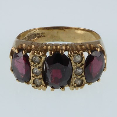 Lot 1072 - A 9ct gold dress ring with three marquise cut...