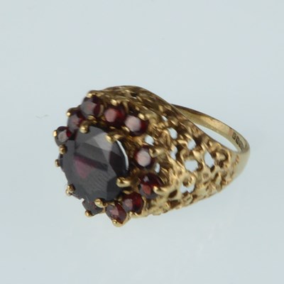 Lot 1052 - A 9ct gold dress ring with principal claw set...