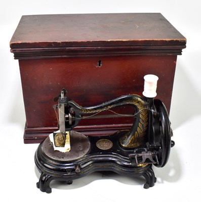 Lot 246 - JONES; an iron framed sewing machine