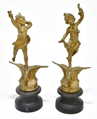 Lot 2130 - A pair of bronzed spelter figures representing...