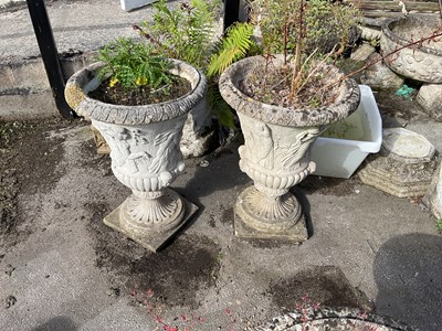 Lot 2374 - A pair of reconstituted stone garden urns,...