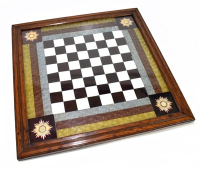 Lot 174 - An early 20th century stained and coloured glass chess board