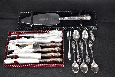 Lot 899 - Five hallmarked silver teaspoons with floral...
