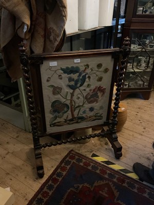 Lot 413 - A Victorian fire screen with needlework...