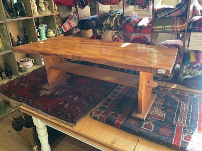 Lot 449 - A vintage elm coffee table, length 133cm,...