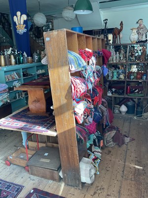 Lot 457 - A vintage teak shop fitter shelf/display stand,...