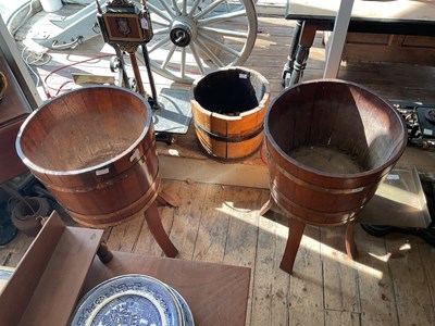 Lot 481 - A pair of brass mounted oak planters on sabre...