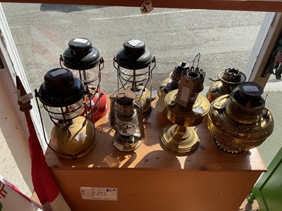 Lot 514 - A collection of assorted oil lamps to include...