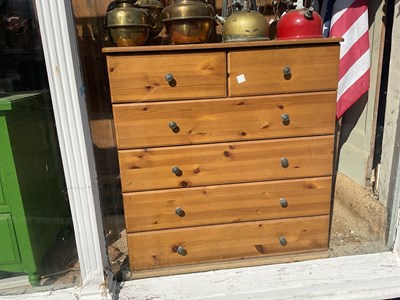 Lot 515 - A modern pine chest of two short over three...