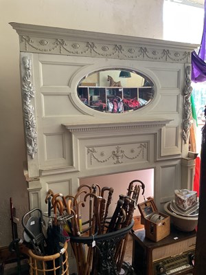 Lot 525 - A decorative white painted fire surround with...