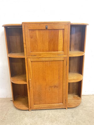 Lot 499 - A golden oak 1930's Art Deco cocktail cabinet...