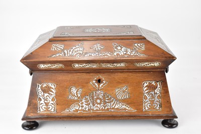 Lot 195 - A Victorian rosewood sewing box of sarcophagus...