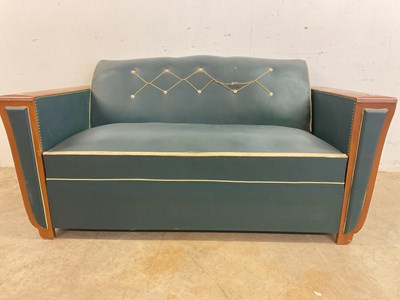 Lot 497 - An Art Deco French Moustache sofa bed with...