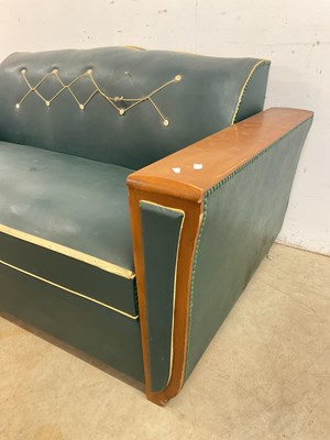 Lot 497 - An Art Deco French Moustache sofa bed with...