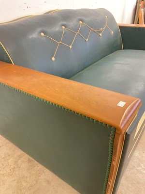 Lot 497 - An Art Deco French Moustache sofa bed with...