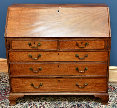 Lot 2503 - A Georgian mahogany bureau with fall front...