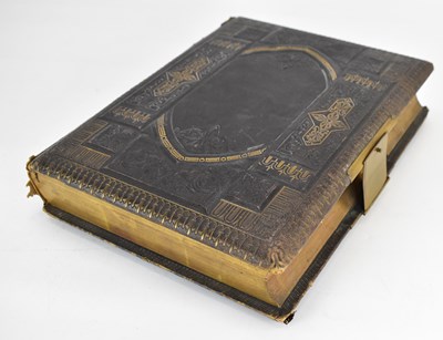 Lot 227 - A Victorian leather musical photograph album,...