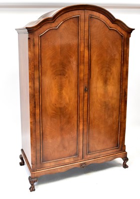 Lot 9 - A modern mahogany dome-topped double wardrobe...