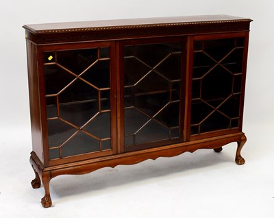 Lot 59 - An early 20th century mahogany bookcase,...