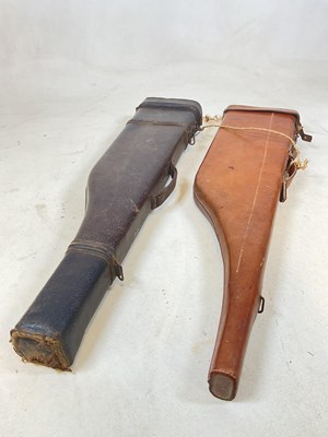 Lot 66 - Two vintage moulded leather leg of mutton gun...