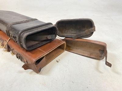 Lot 66 - Two vintage moulded leather leg of mutton gun...