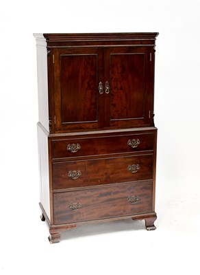 Lot 32 - A reproduction flame mahogany veneered...