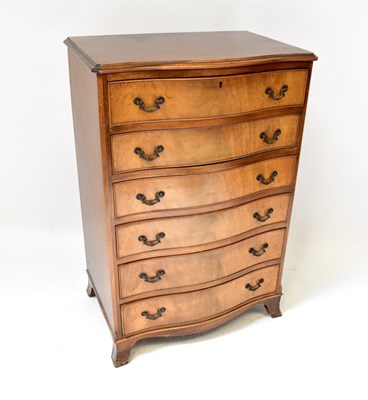 Lot 19 - A reproduction mahogany six-drawer bow front...