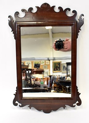 Lot 119 - A Georgian-style mahogany fretwork wall mirror,...