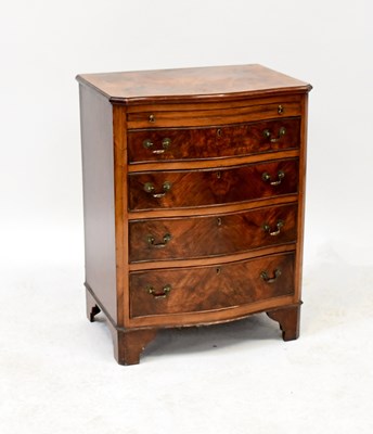 Lot 20 - A reproduction mahogany bow front chest of...