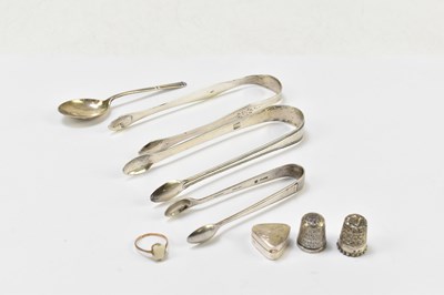 Lot 1113 - Three pairs of hallmarked silver sugar tongs