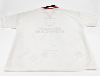 Lot 5212 - MANCHESTER UNITED; an Umbro football shirt...