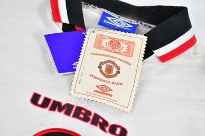 Lot 5212 - MANCHESTER UNITED; an Umbro football shirt...