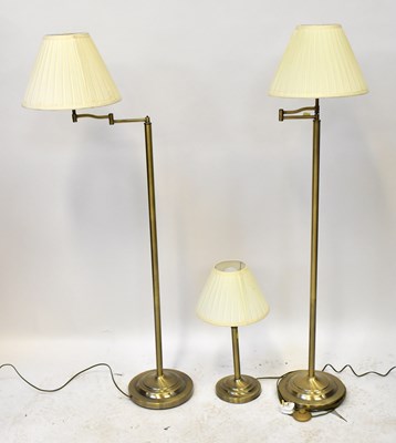 Lot 126 - Two modern standard lamps with lamp fitting on...