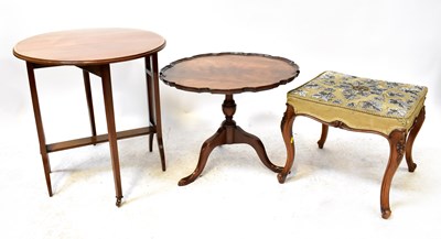 Lot 103 - A reproduction walnut stool with beaded...