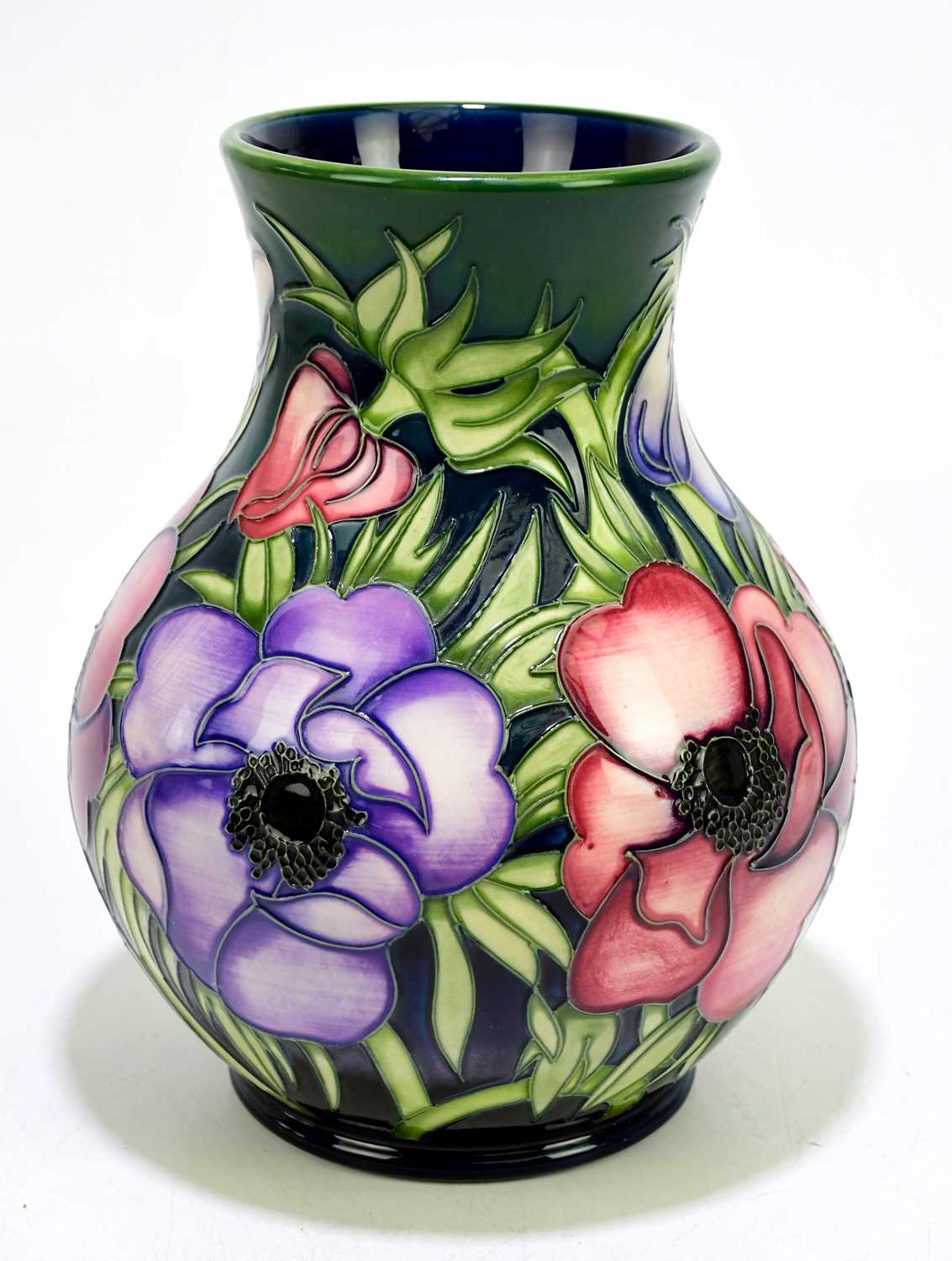 Lot 100 - MOORCROFT; a 'Anemone' pattern vase, impressed...