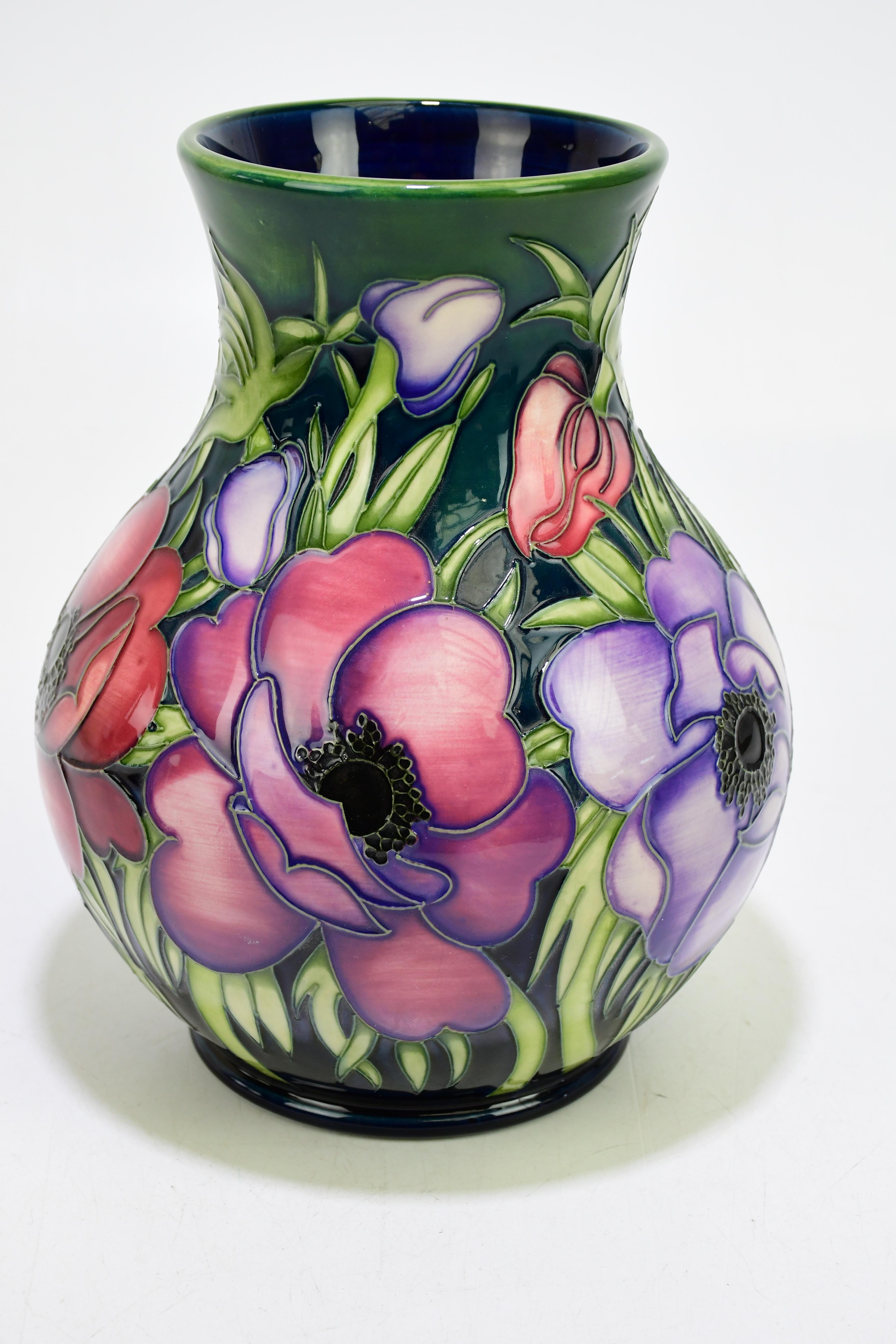 Lot 100 - MOORCROFT; a 'Anemone' pattern vase,