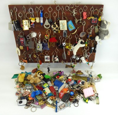 Lot 110 - Approximately one hundred and seventy novelty keyrings.