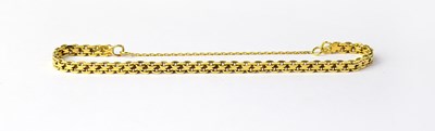 Lot 1146 - An 18ct yellow gold fancy link bracelet with...
