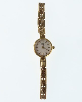 Lot 1421 - UNO; a ladies' 9ct gold wristwatch, the...