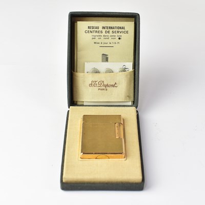 Lot 160 - DU PONT, PARIS; a gold-plated lighter, serial...