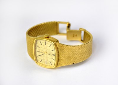 Lot 1392 - BULOVA; a ladies' 18ct yellow gold tank...