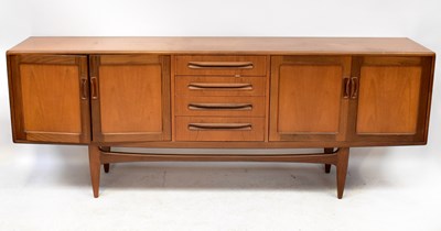 Lot 1 - G-PLAN; a 1960s/70s teak sideboard with...