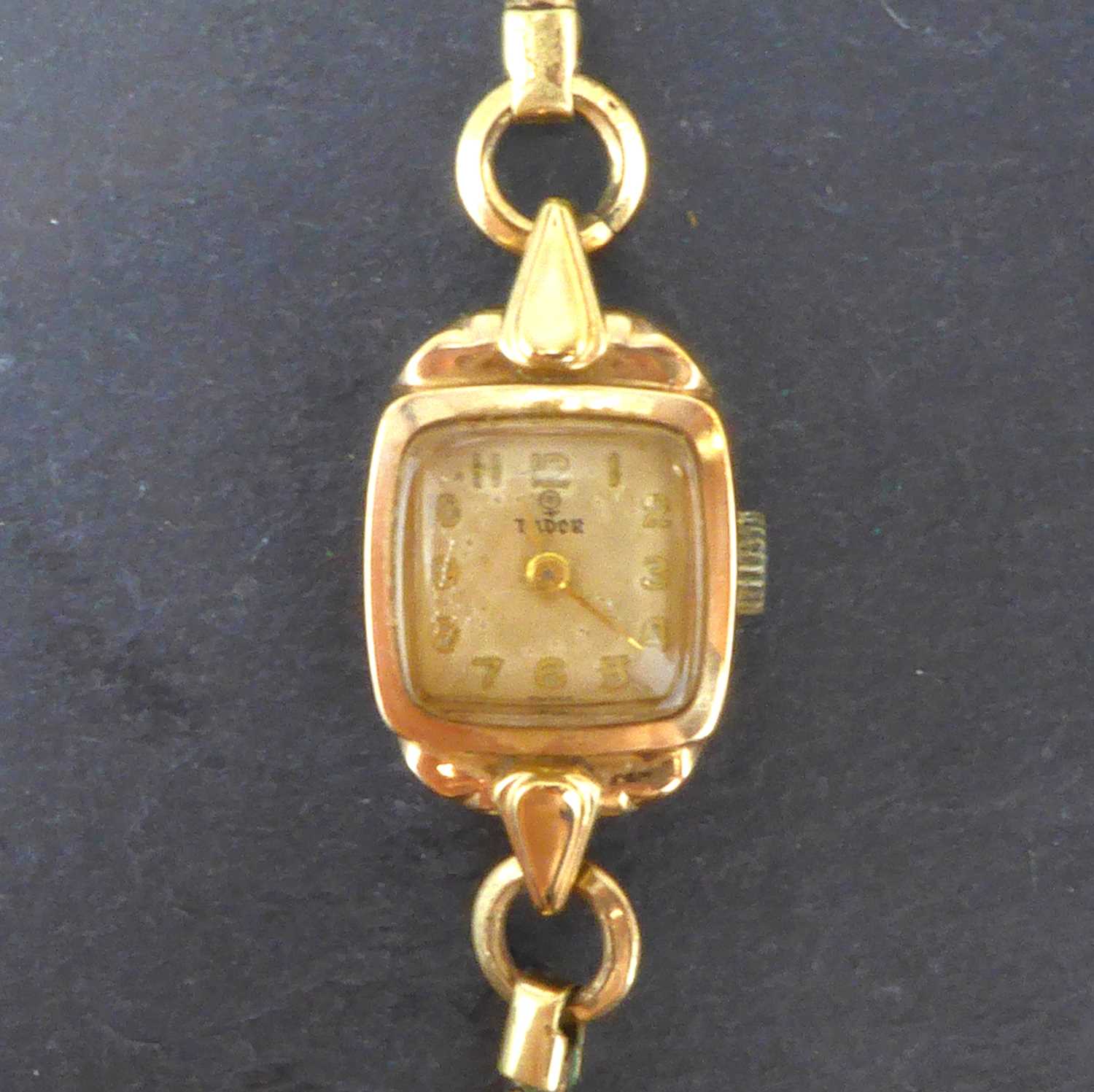 Lot 1420 - TUDOR; a ladies' 9ct gold wristwatch,